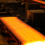 Hot slab casting process with visible longitudinal depressions in a steel plant
